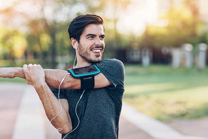 Man stretching before run