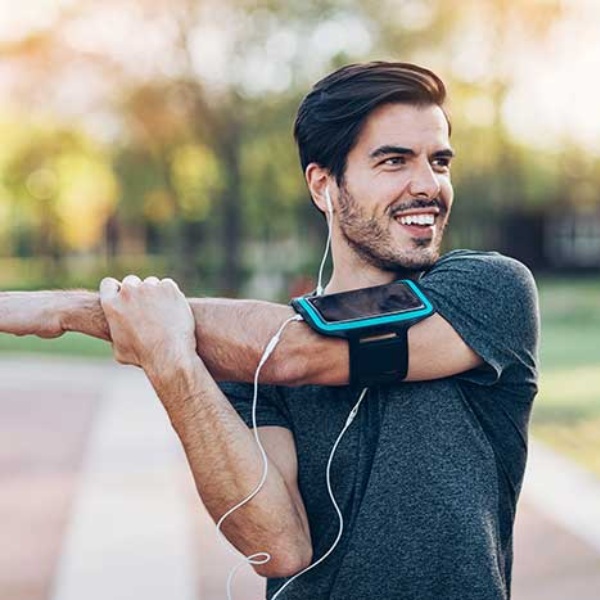 Man stretching outside before his run